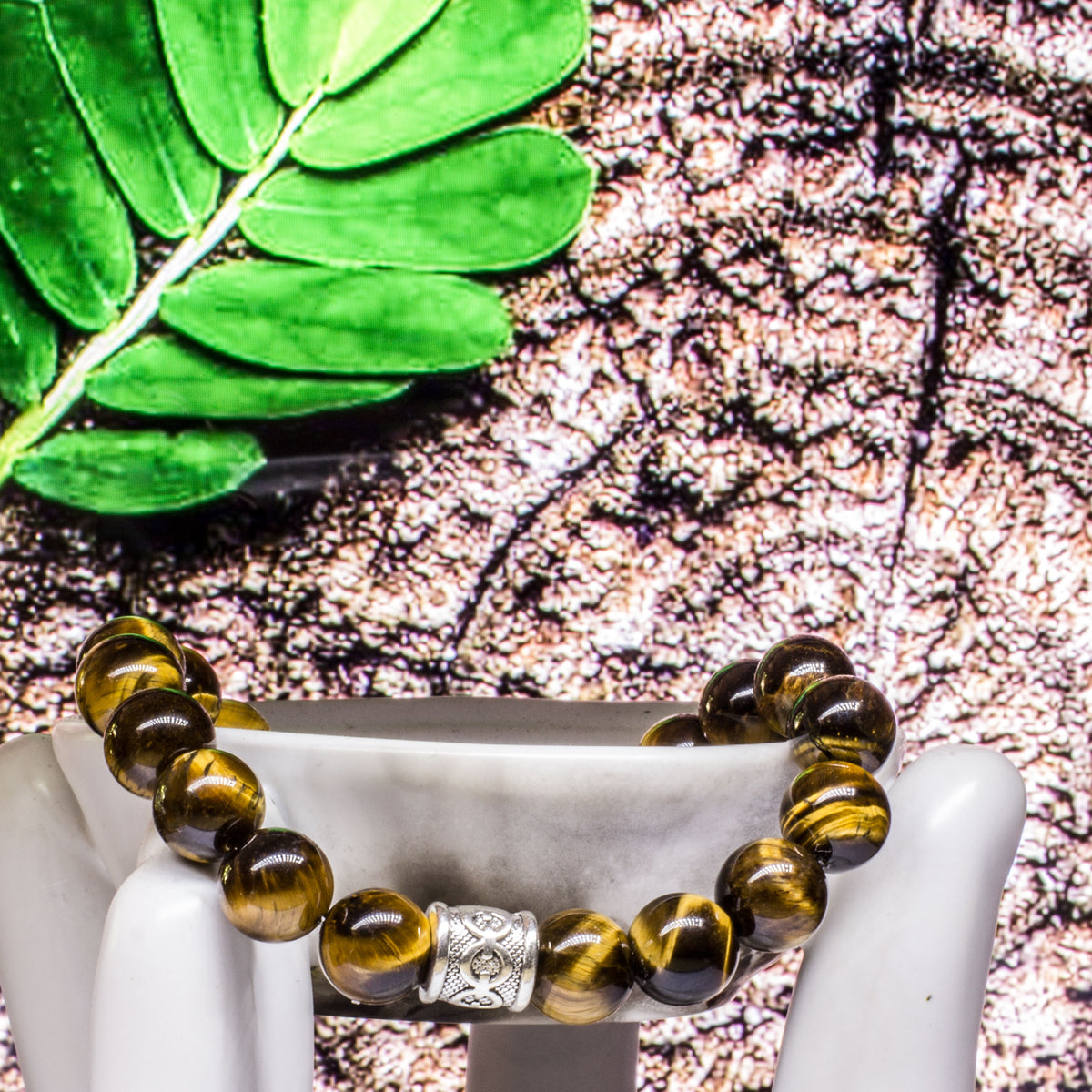 The Abundance Bracelet (10mm) - Tigers Eye is a crystal with beautiful bands of yellow-golden-brown colour running through it. This is a powerful stone that can help you to release anxiety and nervousness and assists in harmony and equilibrium. It is a powerful motivator and one of the best stones for financial success.