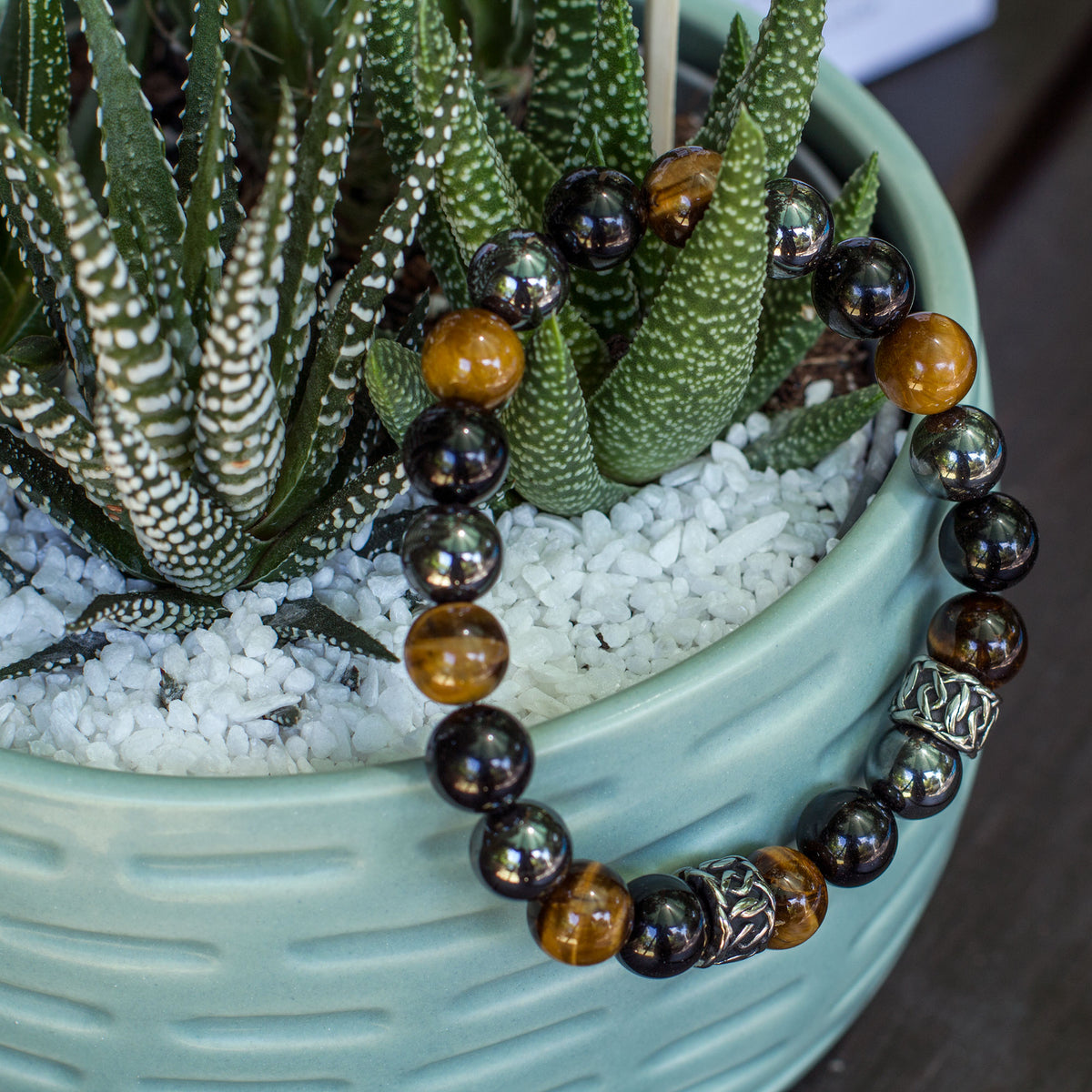 The Triple Protection bracelet 10mm - 3 of the most powerful crystals combined to create perfection. The Triple Protection Bracelet is one of our most sought after bracelets, boasting some of the most incredible gems around. Tiger’s eye, black Obsidian and Hematite is the powerhouse of beads when combined into one.