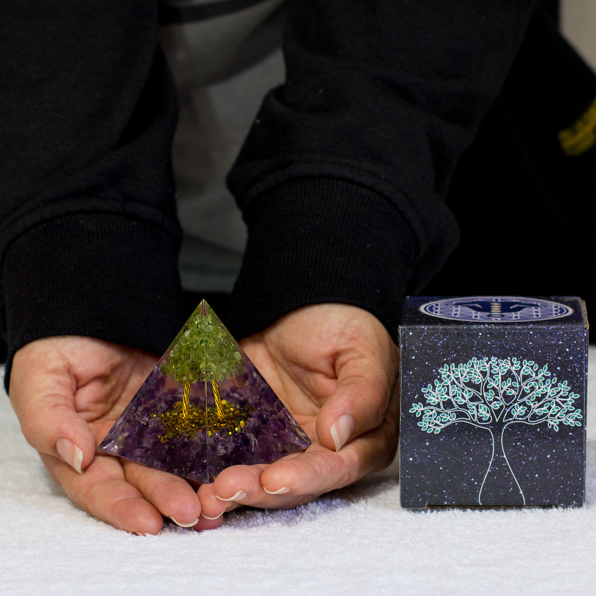 By tapping into the cosmic universal energy with a mix of quartz crystals, semi-precious gemstones, metals, and resin, you can balance out the life energy that surrounds you. Any negative vibes and energy that affect your body and mind can be removed by using an orgonite pyramid in your home. These healing crystals are made of metal shavings, resin, and gemstones, which balance electromagnetic fields and promote positive energy.
