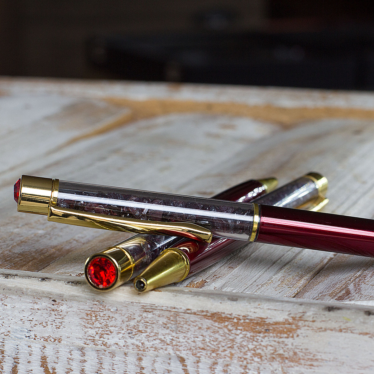 Crystal Pen - Get ready to elevate your writing experience with our meticulously crafted crystal gemstone ballpoint pens. These exquisite pens are designed with precision and attention to detail, featuring stunning crystal chips encased within a transparent cylinder. Each pen is a work of art, showcasing the natural beauty of the crystals. The reflective facets of the crystals catch the light, creating a mesmerizing display that is sure to captivate.
