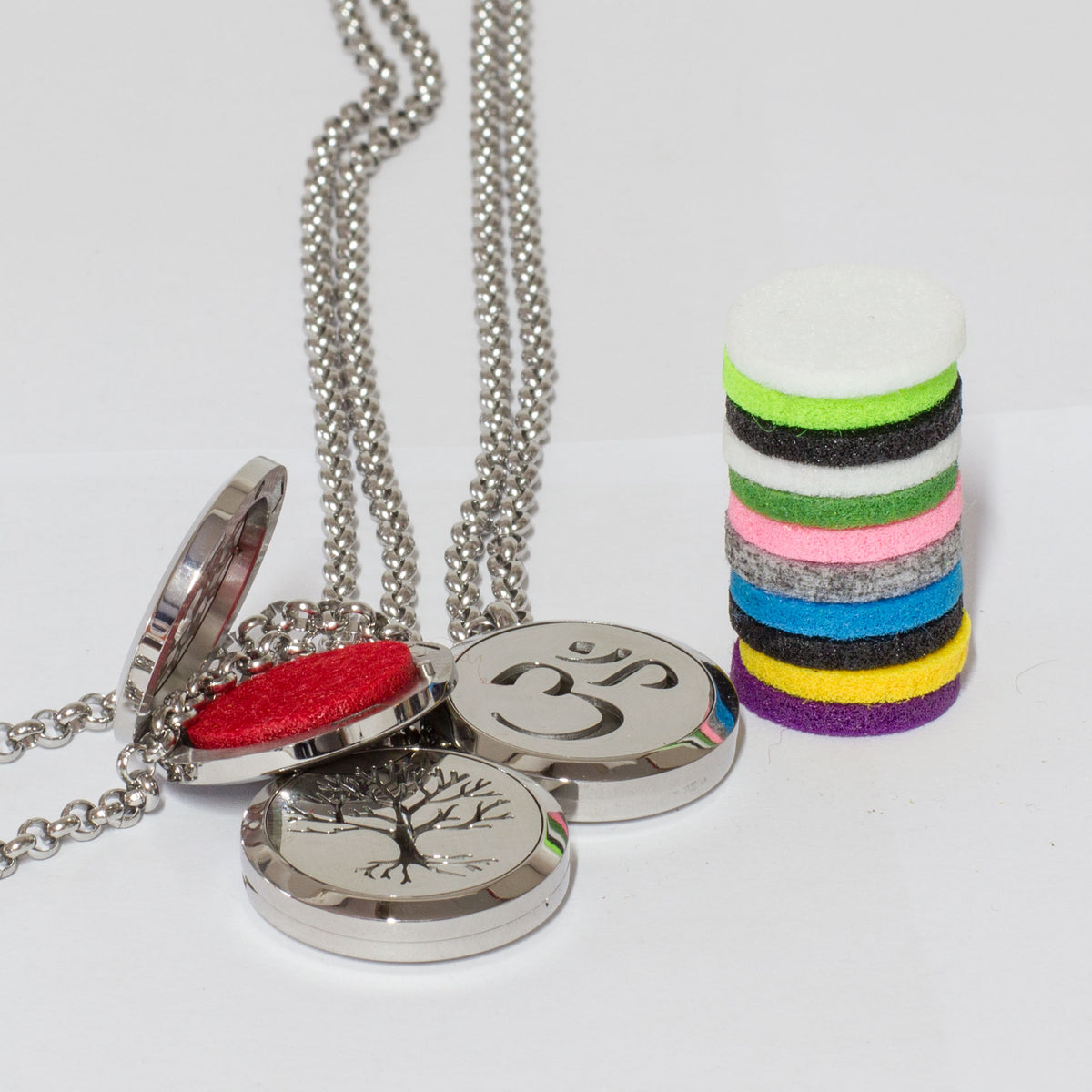 These stunning Sterling silver Diffuser necklace's come with 12 assorted color pads which you dab a few drops of the 7 Chakra oil onto them, leaving you in tranquility all day long, not to mention leaving you smelling great all day. They are packaged in a beautiful wooden box and perfect as a gift. 