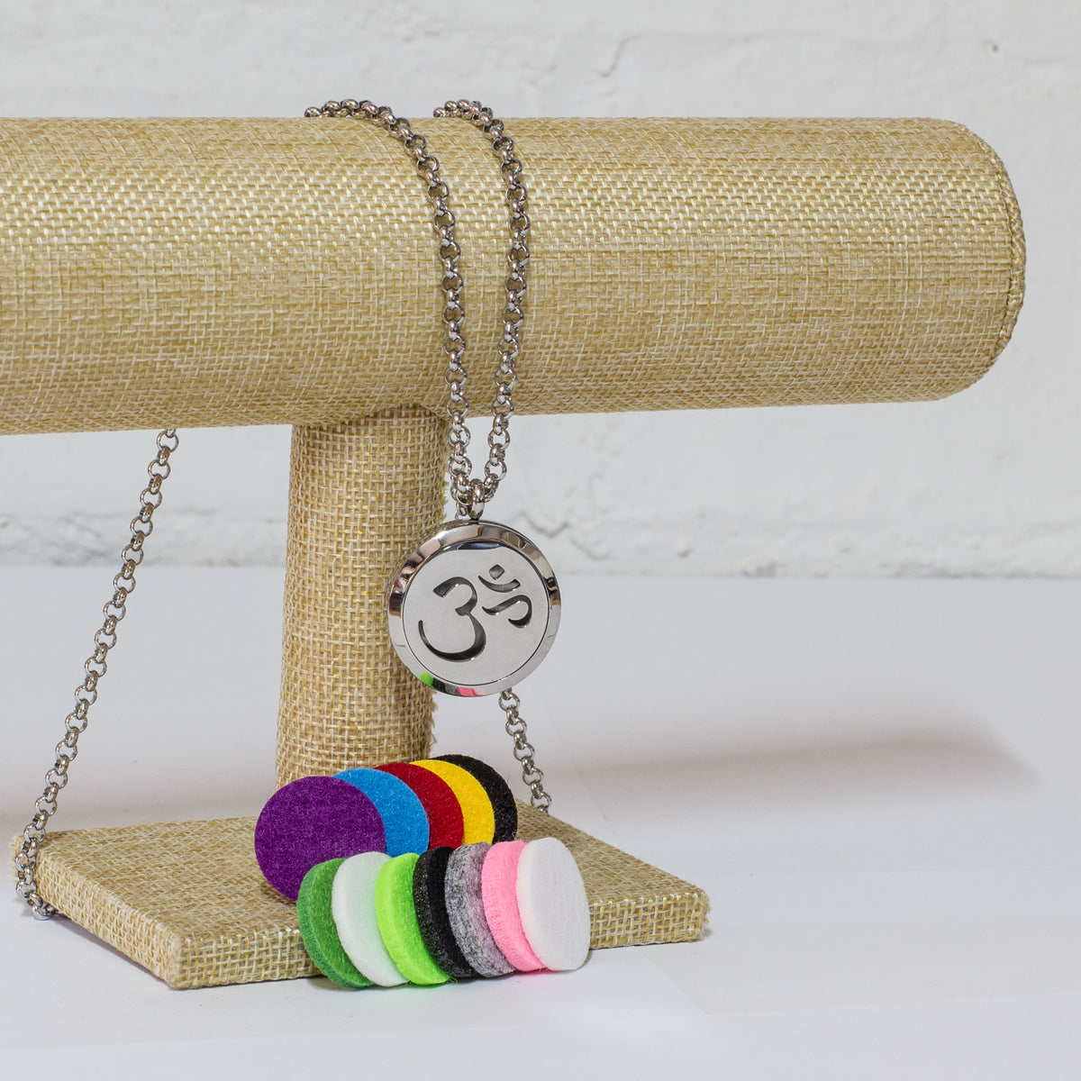 These stunning Sterling silver Diffuser necklace's come with 12 assorted color pads which you dab a few drops of the 7 Chakra oil onto them, leaving you in tranquility all day long, not to mention leaving you smelling great all day. They are packaged in a beautiful wooden box and perfect as a gift. 