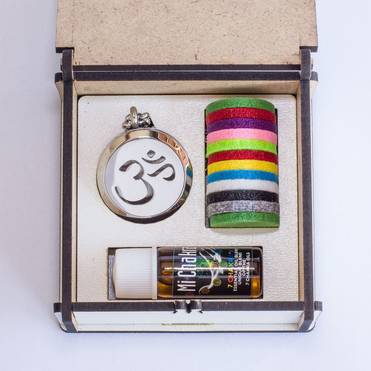 These stunning Sterling silver Diffuser necklace's come with 12 assorted color pads which you dab a few drops of the 7 Chakra oil onto them, leaving you in tranquility all day long, not to mention leaving you smelling great all day. They are packaged in a beautiful wooden box and perfect as a gift. 
