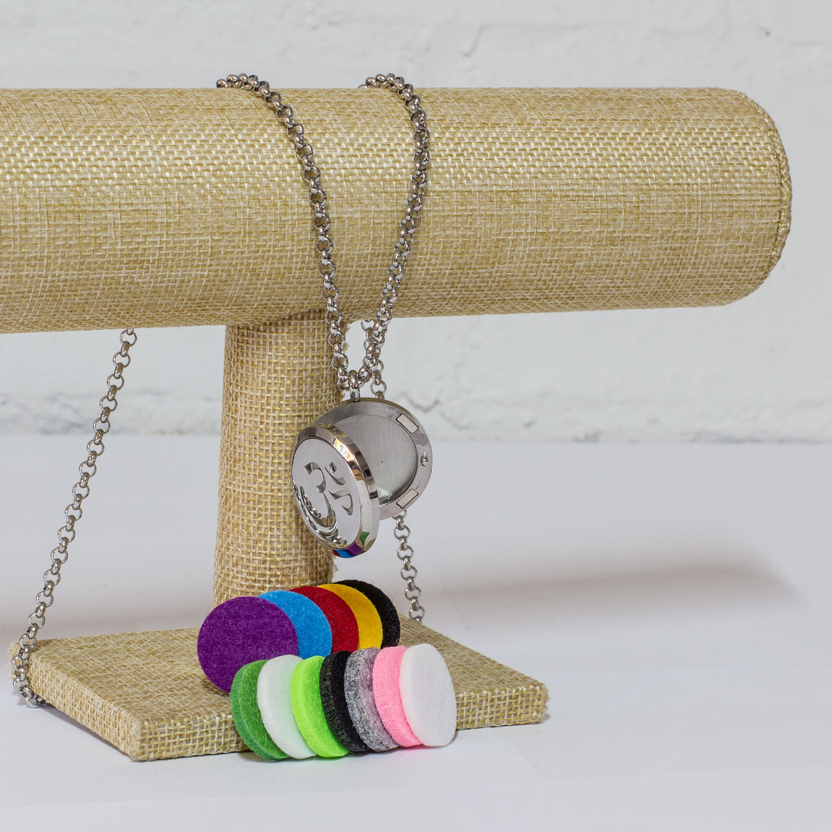 These stunning Sterling silver Diffuser necklace's come with 12 assorted color pads which you dab a few drops of the 7 Chakra oil onto them, leaving you in tranquility all day long, not to mention leaving you smelling great all day. They are packaged in a beautiful wooden box and perfect as a gift. 