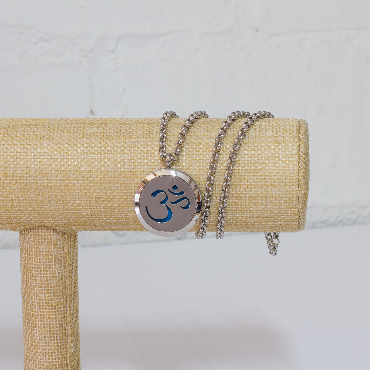 These stunning Sterling silver Diffuser necklace's come with 12 assorted color pads which you dab a few drops of the 7 Chakra oil onto them, leaving you in tranquility all day long, not to mention leaving you smelling great all day. They are packaged in a beautiful wooden box and perfect as a gift. 