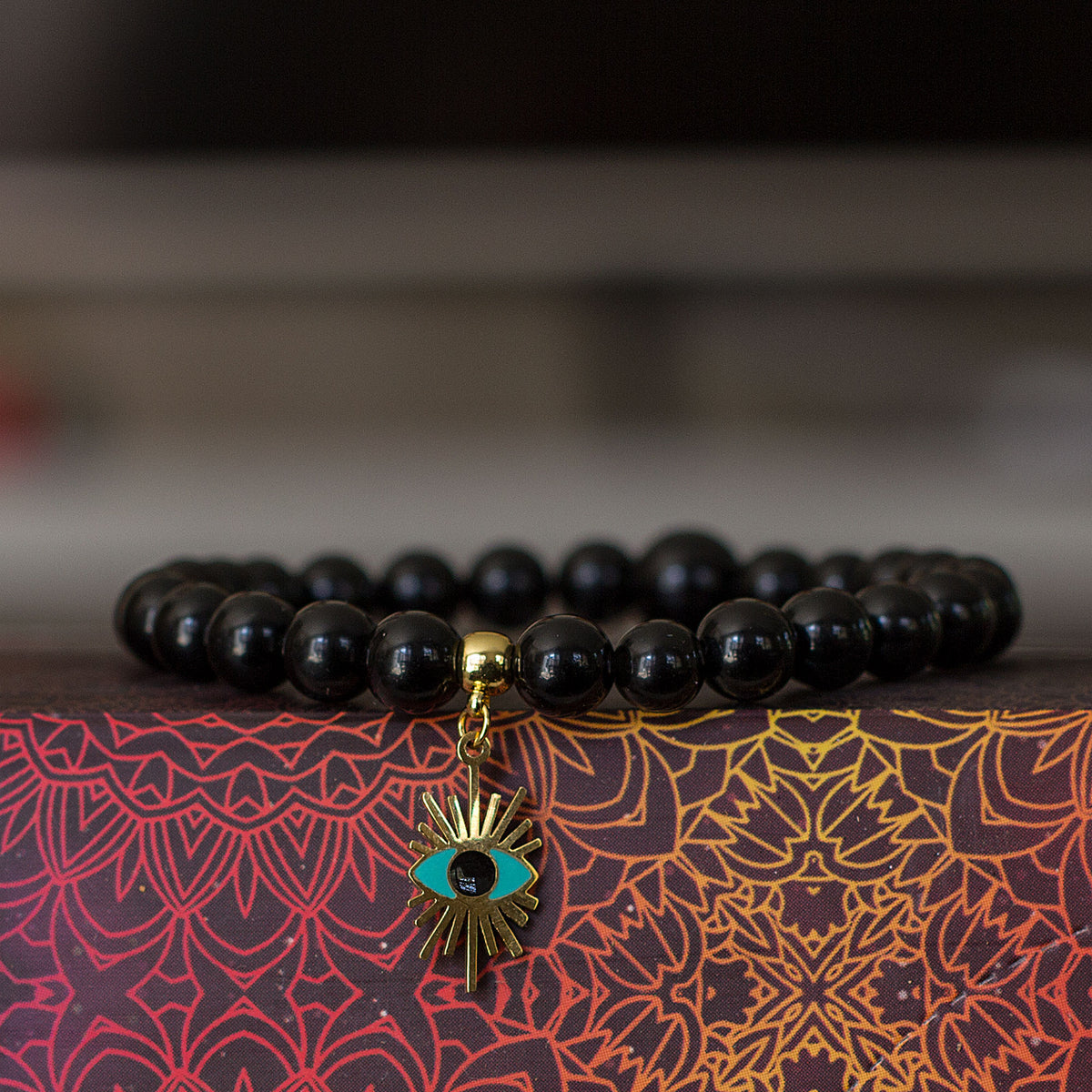 Evil Eye Black Obsidian Bracelet - Rabbi Abraham Isaac Kook explained that the &quot;evil eye&quot; is an example of how one soul can affect another through unseen connections between them. We are all influenced by our environment. The evil eye represents the venomous impact from malignant feelings of jealousy and envy of those around us. It is the belief that someone can have power over you or cause you harm, and wearing an evil eye talisman can be a way to protect yourself.