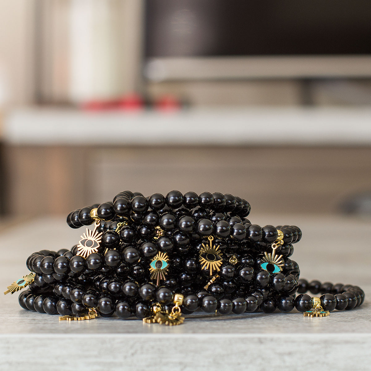 Evil Eye Black Obsidian Bracelet - Rabbi Abraham Isaac Kook explained that the &quot;evil eye&quot; is an example of how one soul can affect another through unseen connections between them. We are all influenced by our environment. The evil eye represents the venomous impact from malignant feelings of jealousy and envy of those around us. It is the belief that someone can have power over you or cause you harm, and wearing an evil eye talisman can be a way to protect yourself.