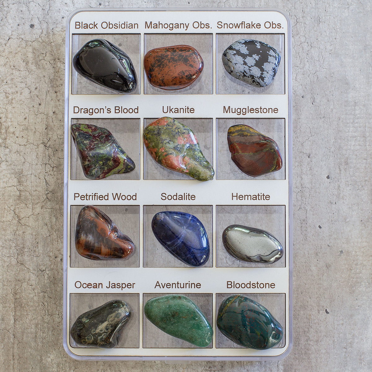 Unleash the captivating beauty and powerful healing abilities of 12 mesmerizing crystals. Each crystal is a masterpiece of nature, possessing its own unique qualities and benefits that can help you feel more centered, focused, and balanced. These precious gems are carefully safeguarded in a pristine, transparent case that elegantly showcases each crystal&#39;s name, allowing you to revel in their beauty and magic.