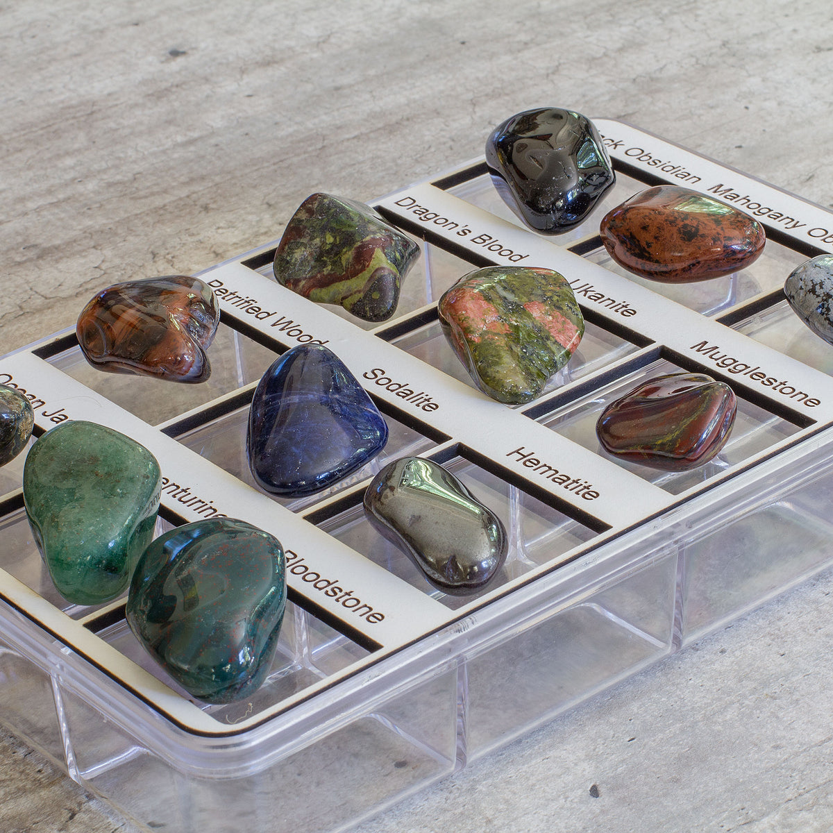 Unleash the captivating beauty and powerful healing abilities of 12 mesmerizing crystals. Each crystal is a masterpiece of nature, possessing its own unique qualities and benefits that can help you feel more centered, focused, and balanced. These precious gems are carefully safeguarded in a pristine, transparent case that elegantly showcases each crystal&#39;s name, allowing you to revel in their beauty and magic.