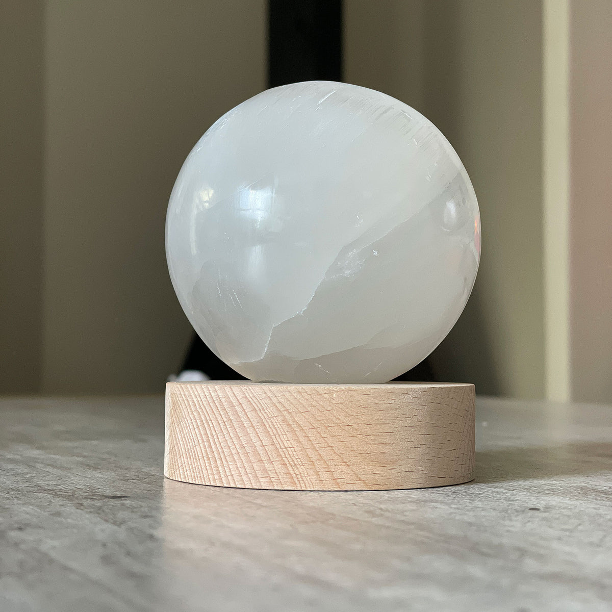 Selenite Lamp - Sphere - Selenite is a beautiful and versatile crystal that offers numerous benefits, making it a popular choice for both decor and holistic purposes. Its natural beauty and unique translucent appearance make it an eye-catching addition to any home.