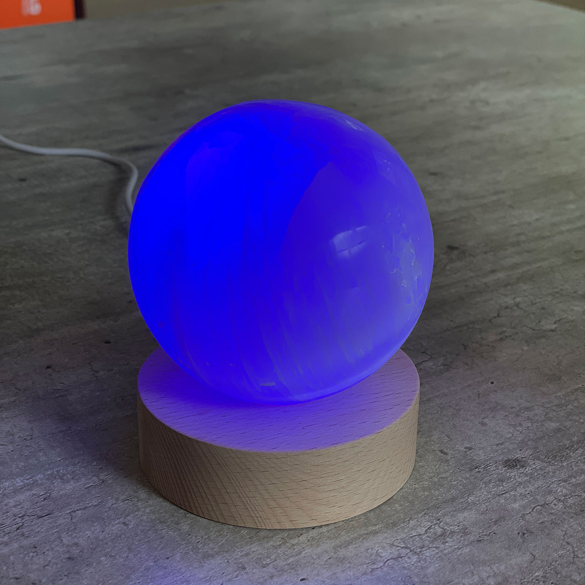 Selenite Lamp - Sphere - Selenite is a beautiful and versatile crystal that offers numerous benefits, making it a popular choice for both decor and holistic purposes. Its natural beauty and unique translucent appearance make it an eye-catching addition to any home.