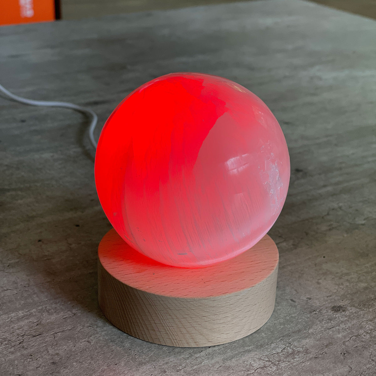 Selenite Lamp - Sphere - Selenite is a beautiful and versatile crystal that offers numerous benefits, making it a popular choice for both decor and holistic purposes. Its natural beauty and unique translucent appearance make it an eye-catching addition to any home.