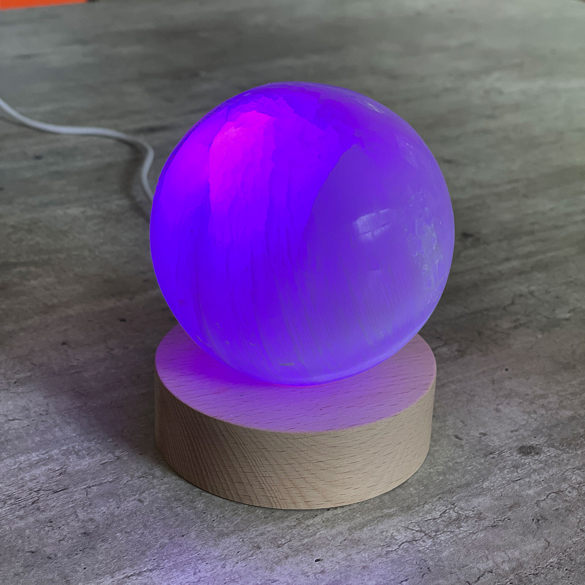 Selenite Lamp - Sphere - Selenite is a beautiful and versatile crystal that offers numerous benefits, making it a popular choice for both decor and holistic purposes. Its natural beauty and unique translucent appearance make it an eye-catching addition to any home.