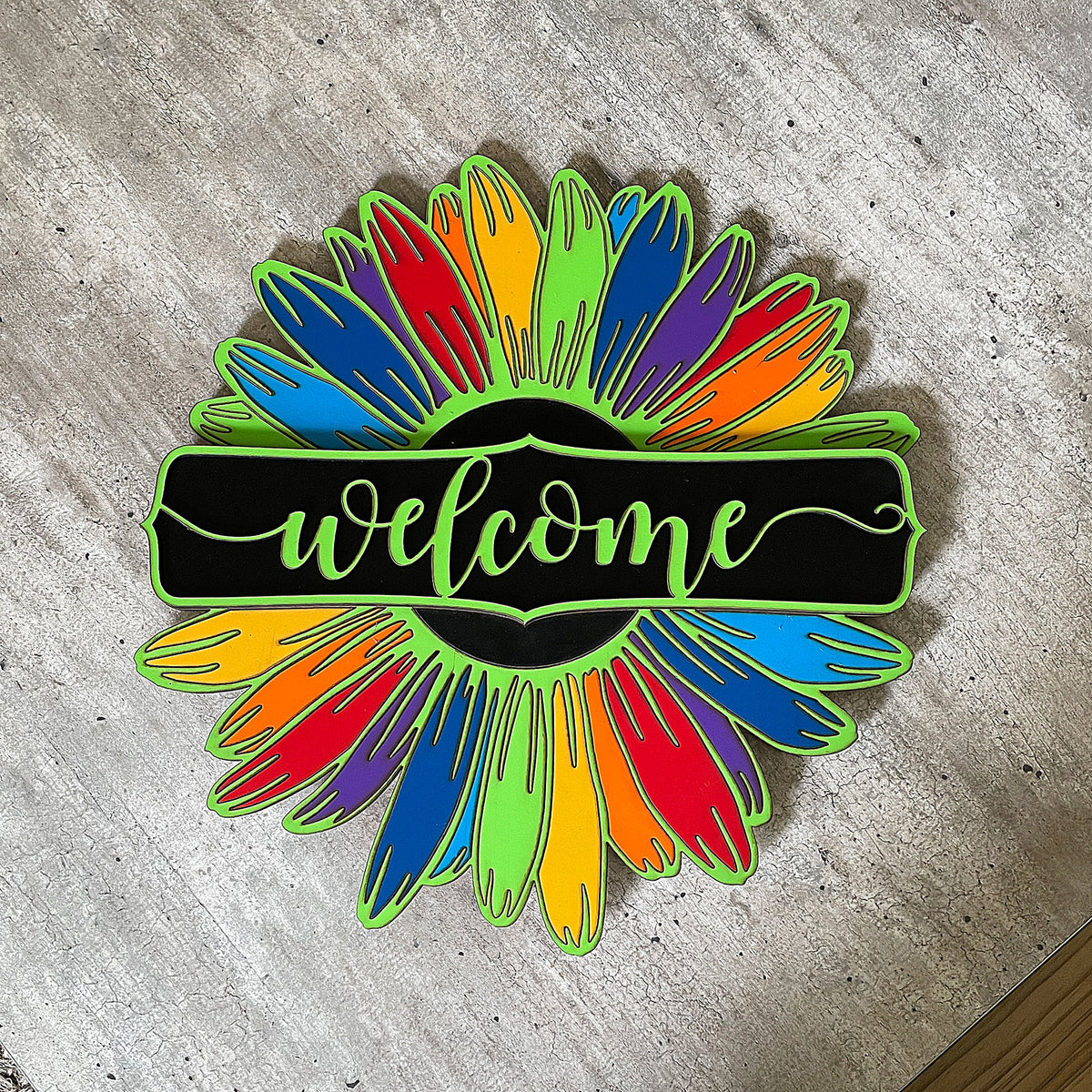 Welcome Door Sign - Transform the entrance of your abode into a warm and inviting space with a personalized welcome sign that speaks volumes about your personality and outlook on life. This eye-catching display showcases a vibrant mixture of colors inspired by the seven chakras, symbolizing balance, harmony, and positivity. It will undoubtedly grab the attention of your guests, leaving them with a lasting impression of your home&#39;s unique charm. Every time you come back,