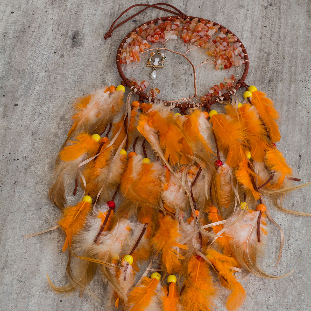 Red-Aventurine-Orange-Dream-catcher - Just the words dream and catcher in one sentence resonates in my soul as a belief that is possible to dream then catch that dream to make it a reality. Weather we day dreaming or night time dreaming the thought of it becoming a reality are far to fascinating to ignore, especially if there is even the slightest truth to the century old beliefs of Native Americans.